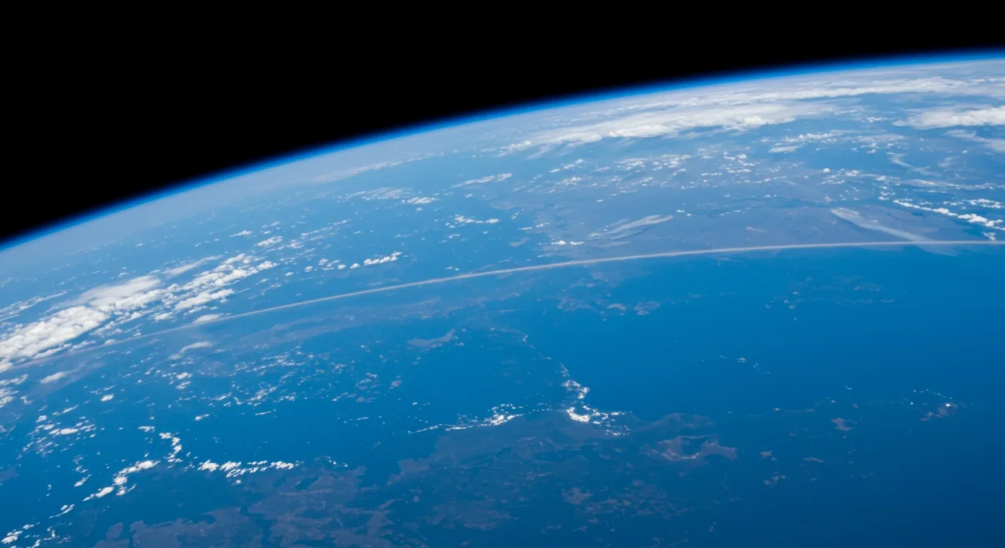 Earth's thin atmospheric layer visible from orbit demonstrating planetary fragility